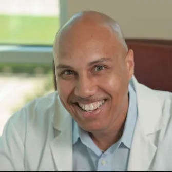 Portrait photo of doctor Brent Johnson, an endodontist in Uptown Dallas